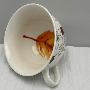 STARBUCKS Collectible Ceramic Mug with Textured Brown Leaves Orange Leaf Inside